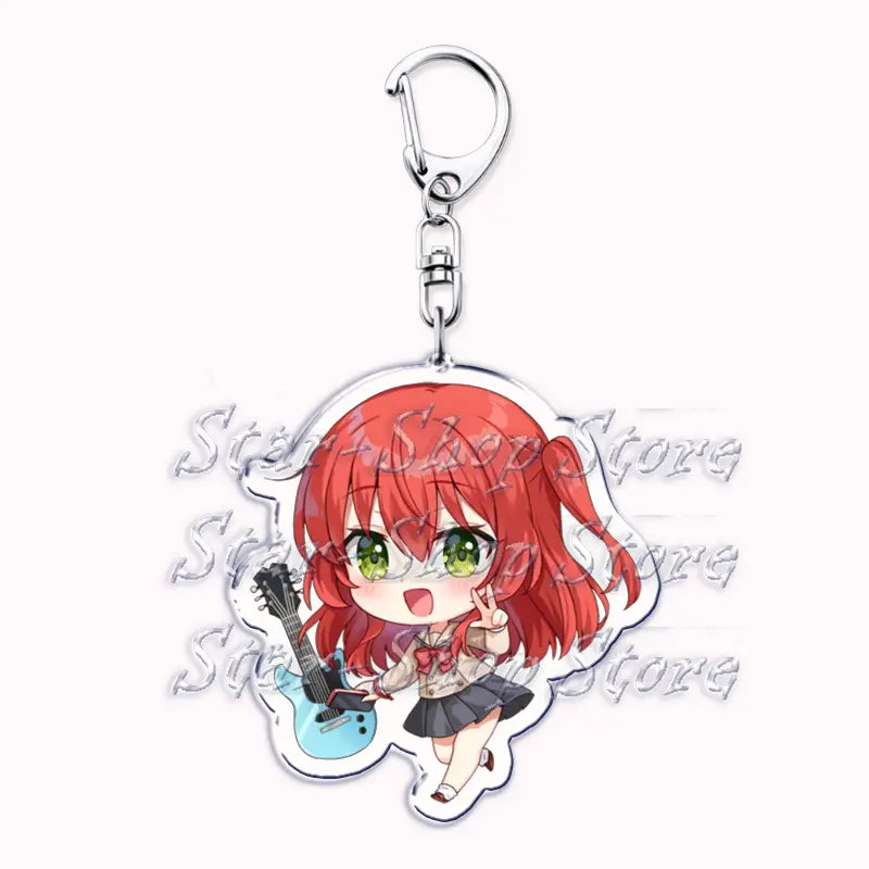 A clear acrylic keychain featuring a chibi style anime girl bocchi the rock with vibrant red hair and green eyes holding a light blue electric guitar.