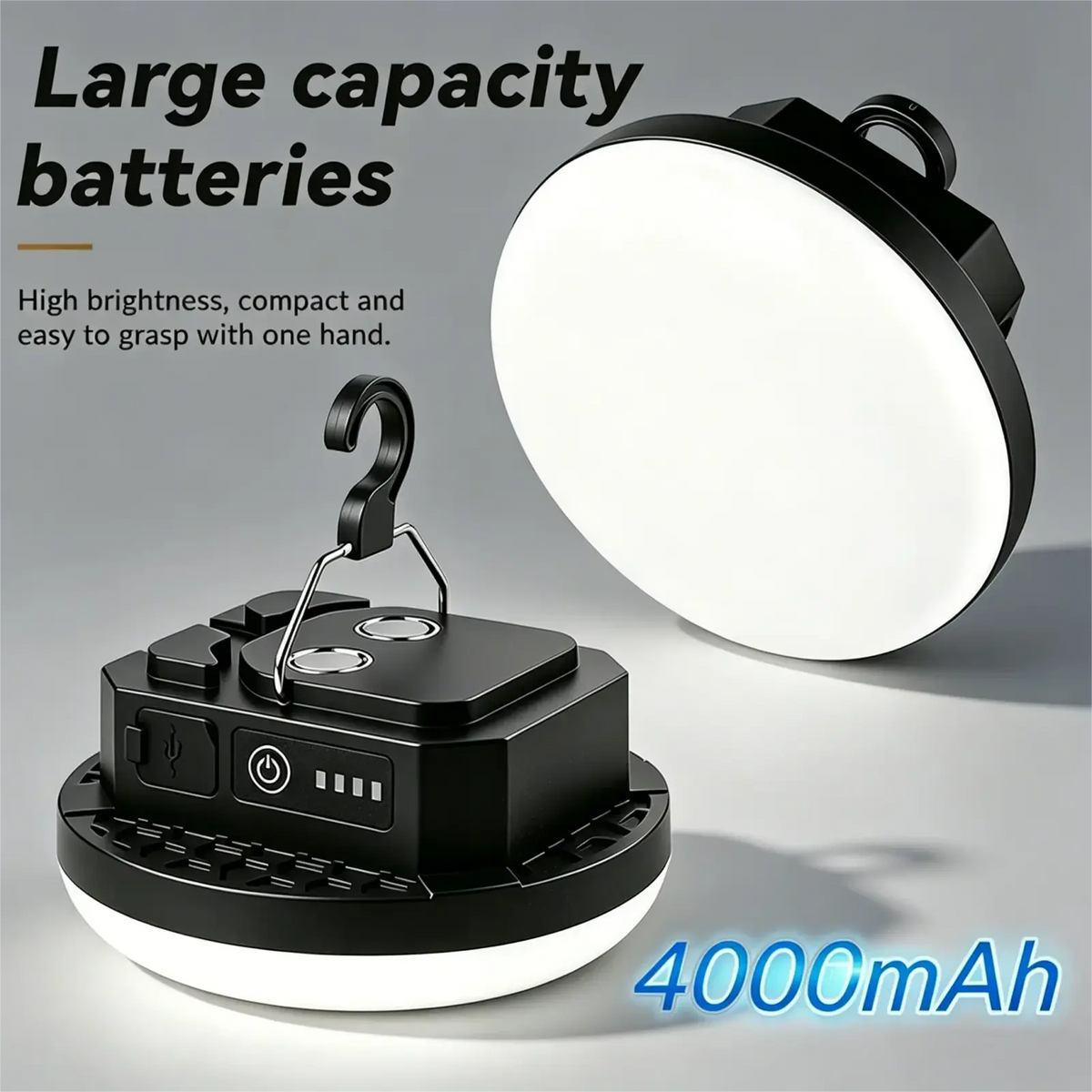 Black portable led camping light with bright white illuminated panel and rechargeable battery for outdoor use with blue light