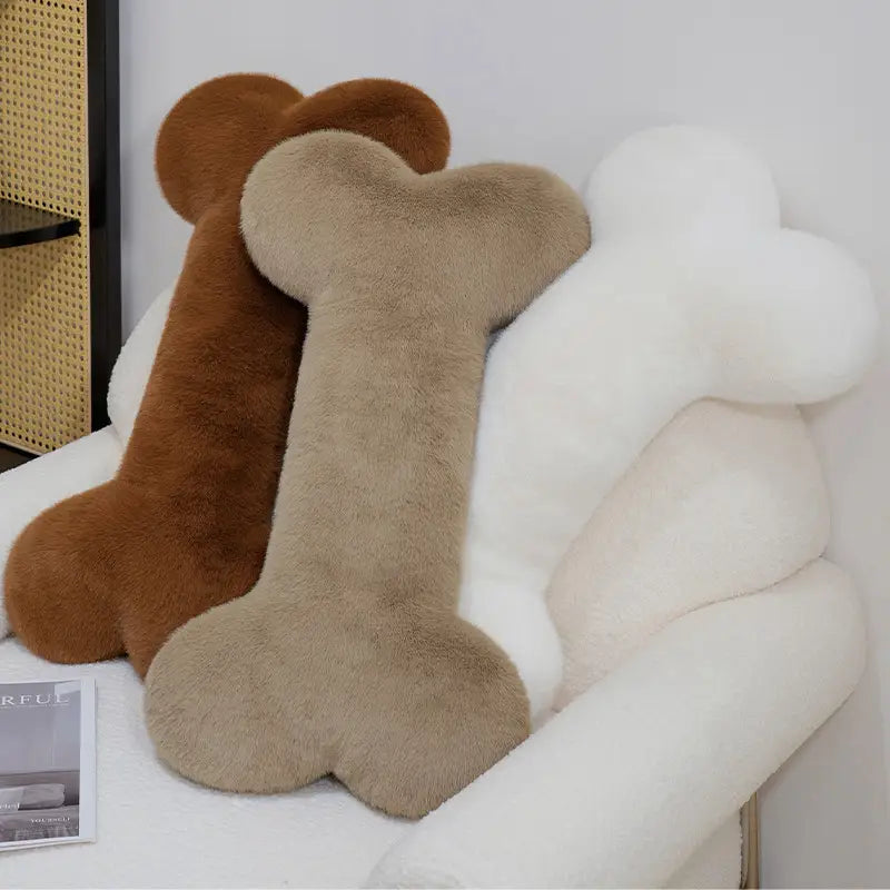 Soft nap cushions in kawaii bone shape plush design featuring brown beige and white colors made from plush material