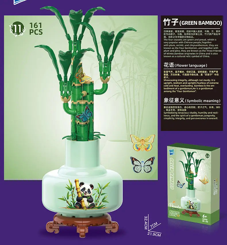 A green bamboo plant with butterflies made from lego compatible building blocks displayed in a light blue ceramic vase with a panda design as a flower potted plant toy.