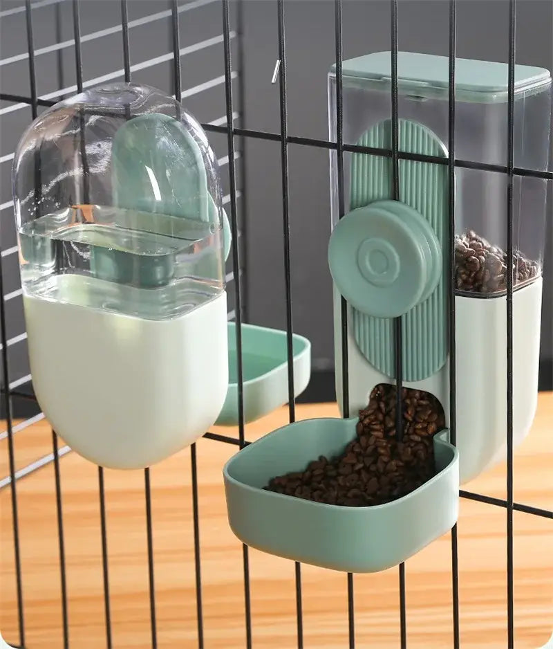 A sleek mint-green automatic pet feeder made of high-quality plastic with food storage and a clear water reservoir mounted on cage bars.