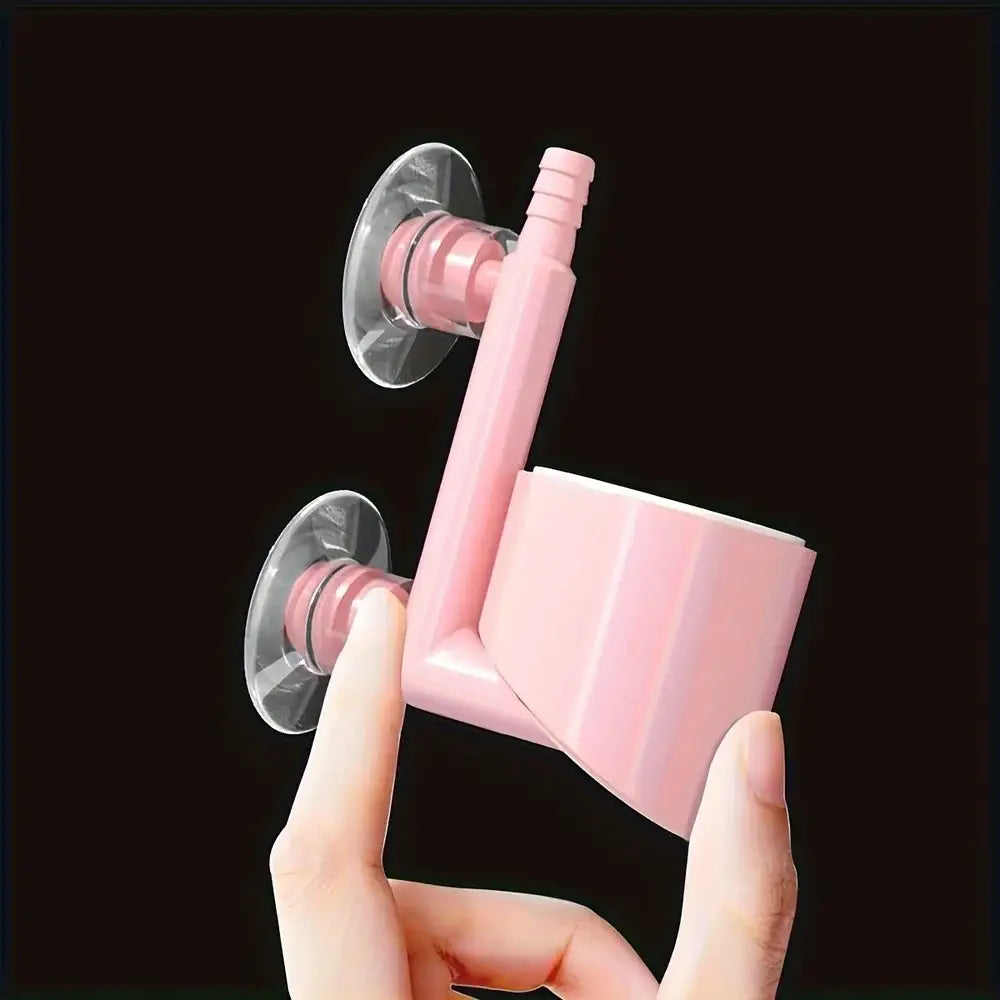 Mini oxigenador de bomba de aire para acuario para tanques de peces, con un soporte para cepillo de dientes de plástico rosa montado con ventosa, de diseño curvado y dos bases circulares transparentes.