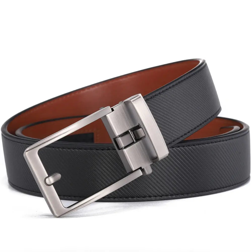 Black leather mens belt with a silver-toned automatic buckle and tan inner lining.