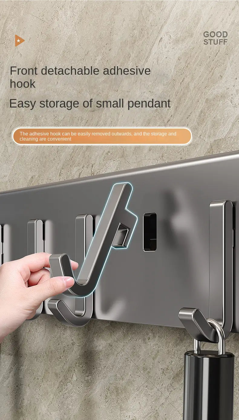 silver metallic front detachable adhesive hook with a sleek modern design on a wall mounted kitchen utensil holder and knife rack