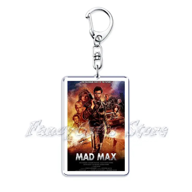 Silver rectangular acrylic keychain featuring a vibrant mad max movie poster with bold white lettering and dynamic character imagery from the movie poster acrylic keychain set.