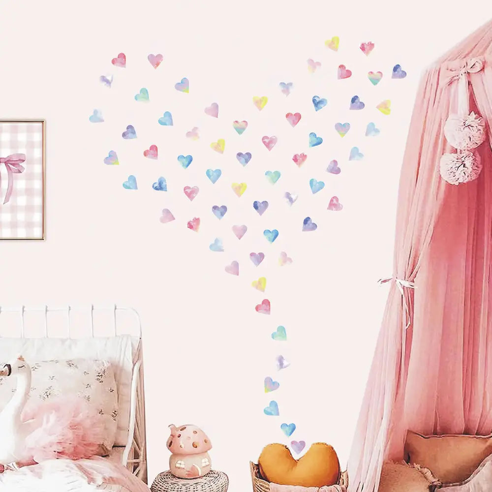 A pastel rainbow heart-shaped wall decal made of removable adhesive vinyl for colorful hearts couple wall stickers decoration.