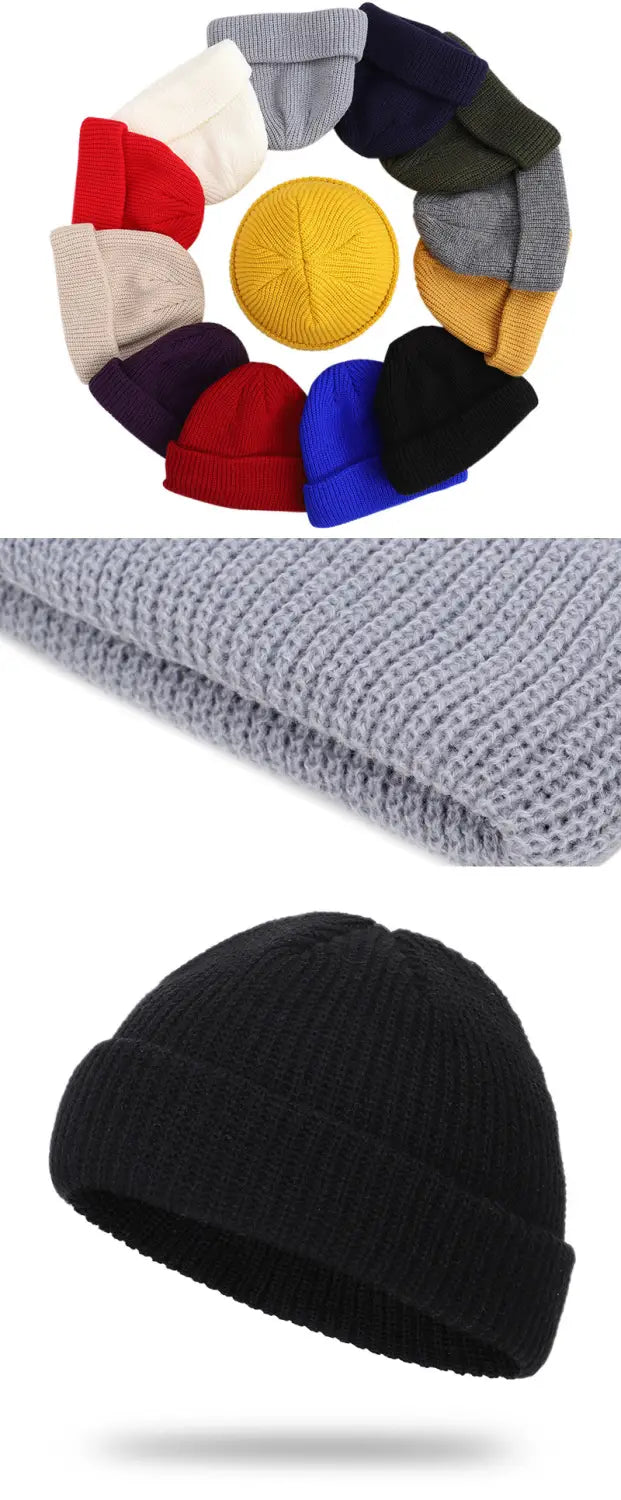 Black ribbed knit winter beanie hat with a folded brim made of warm knitted material for unisex use.