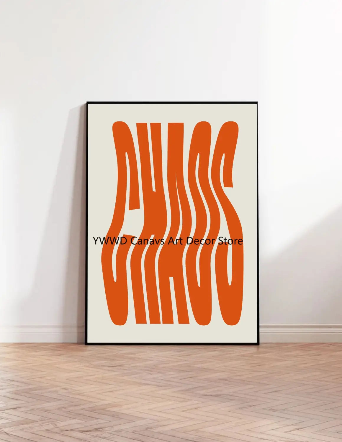 an orange chaos art print displayed in a sleek black frame featured in the ciao bella striped canvas wall art poster product.
