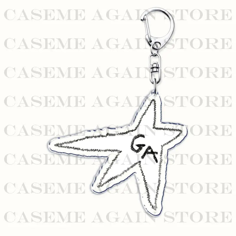 Silver star-shaped acrylic keychain with embroidered outline and black ga initials designed as a Gracie Abrams anime fan gift.