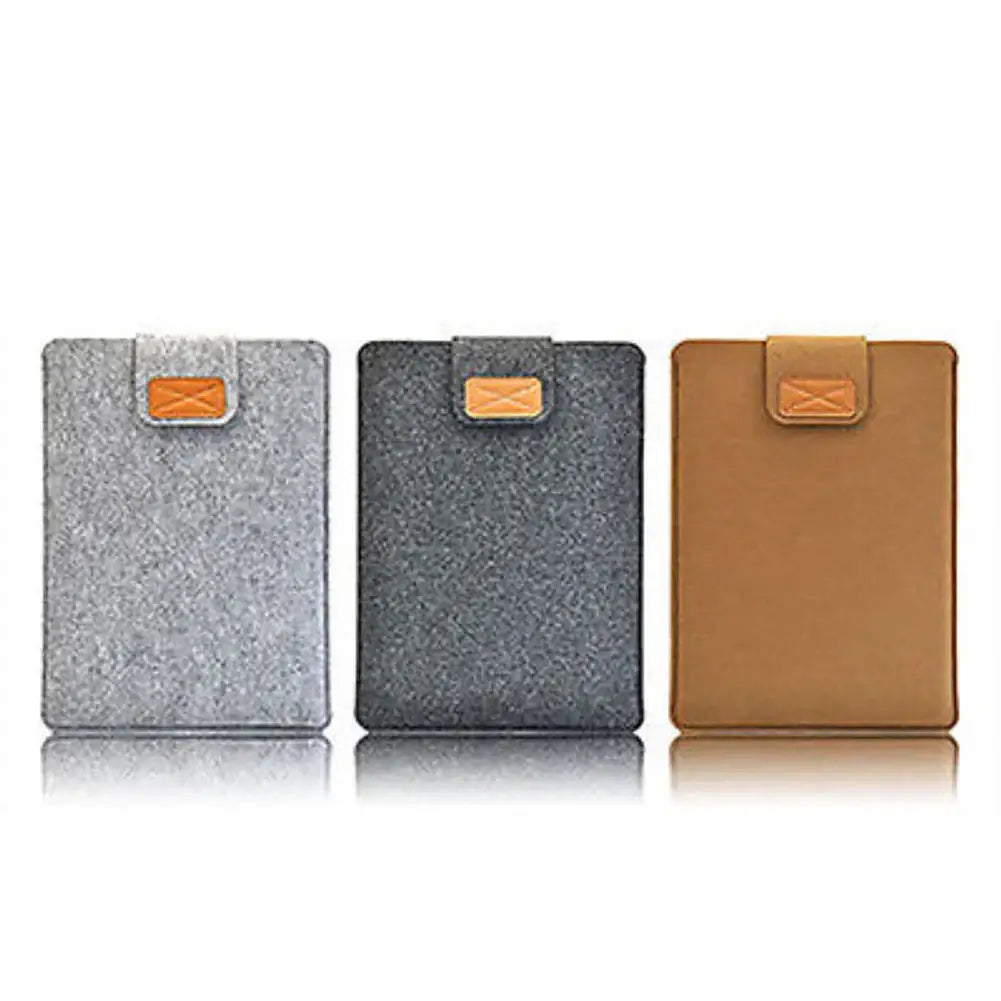 three felt tablet bag cases in gray dark gray and tan with orange leather accents designed as a laptop bag sleeve for macbook air