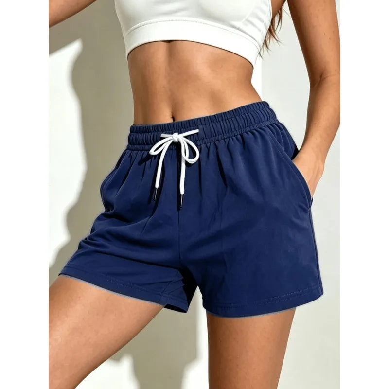 Women's summer shorts are made of slightly elastic and comfortable fabric. Comes with drawstring waistband and pockets