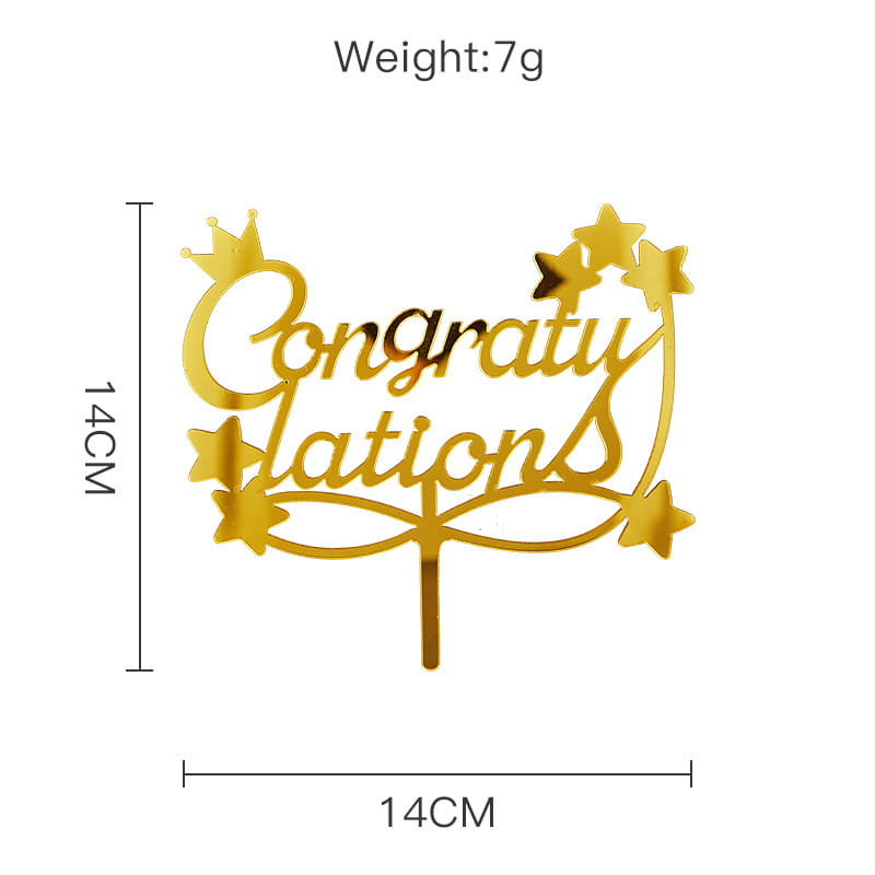Gold acrylic graduation cake topper featuring a metallic congratulations design adorned with stars and a crown.