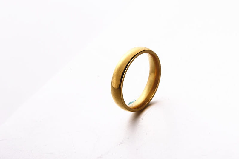 Rose gold stainless steel wedding band ring with a smooth finish and 6mm width.
