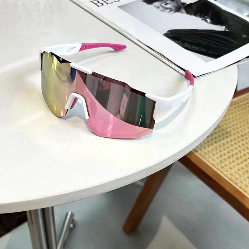 Gafas de sol para ciclismo deportivo al aire libre de color blanco y rosa con protección UV400 y lentes reflectantes de degradado, diseñadas como gafas tipo círculo.