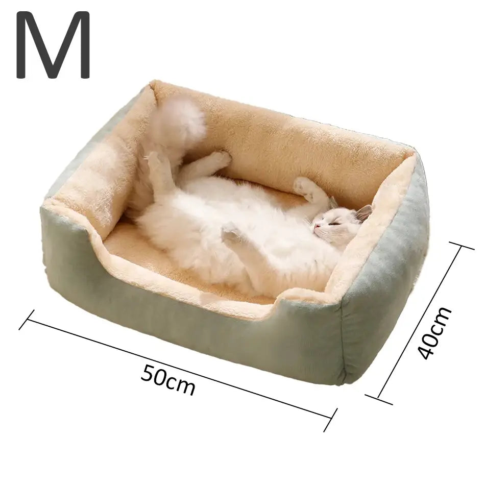 A cozy rectangular pet bed with a soft mint green exterior and plush beige cushioned interior designed for cats in a plush rectangular cat bed soft pet basket.