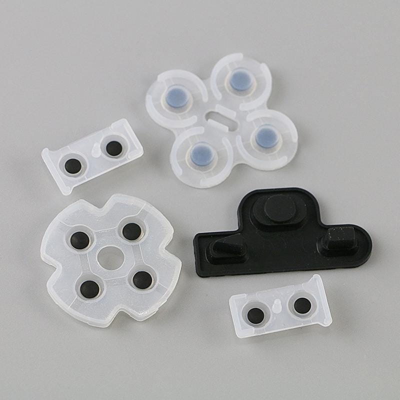 Weiße und schwarze Kunststoff-Tastenabdeckungen für Spielcontroller mit kreisförmigen Vertiefungen für ein leitfähiges Gummipol-Set für den PlayStation-3-Controller