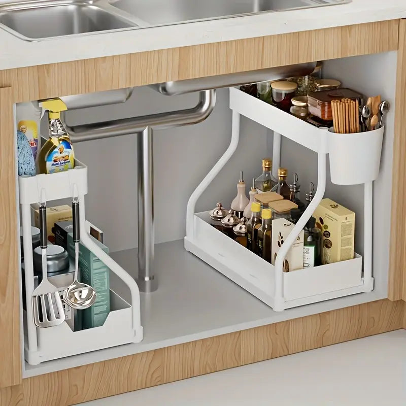 white under-sink organizer with a pull-out design, two tiers, and stainless steel construction for kitchen sink storage and essentials organization