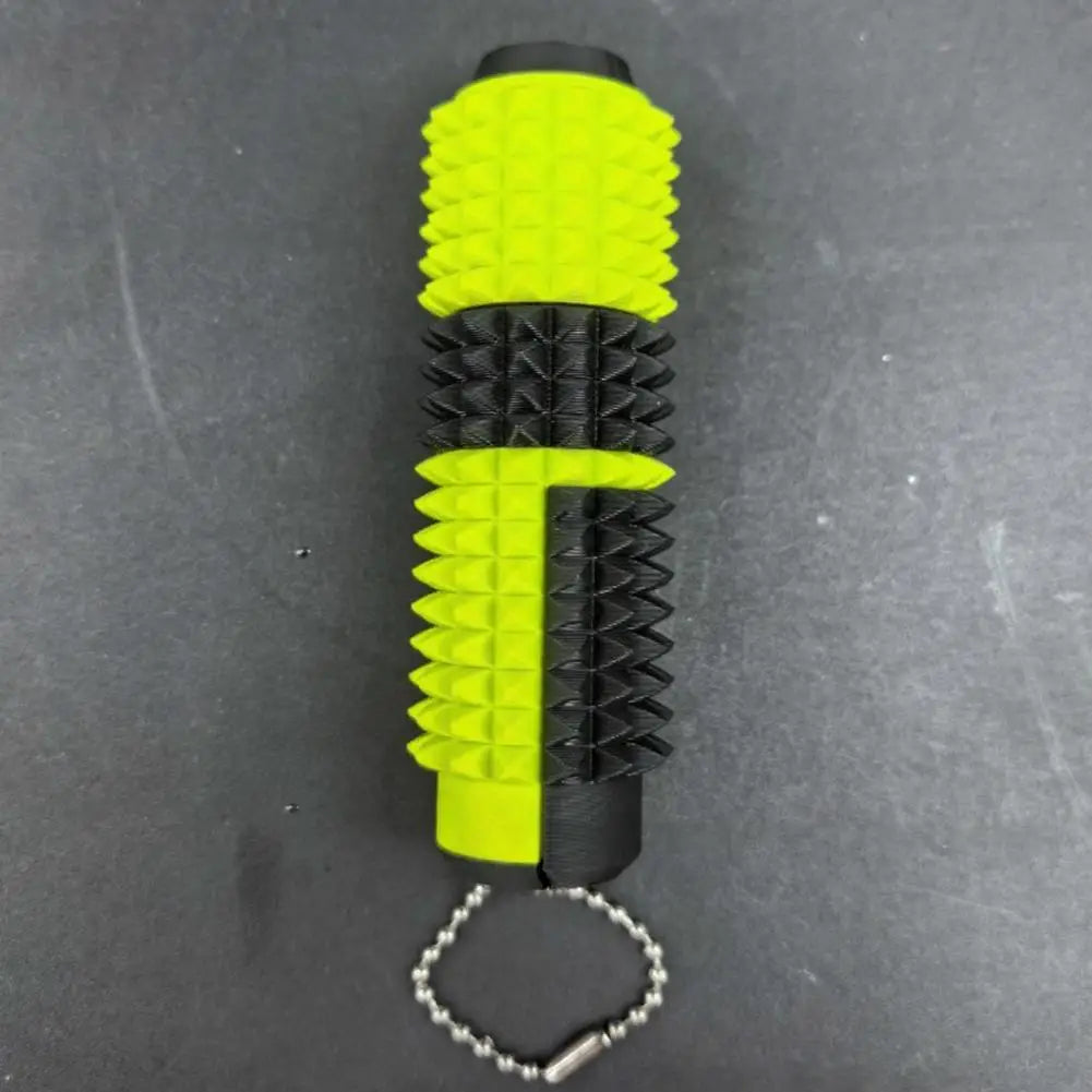 Rodillo giratorio para fidget con pinchos verde neón brillante y negro, fabricado en espuma, con un accesorio de cadena plateada, diseñado como juguete antiestrés tipo fidget 5 en 1.