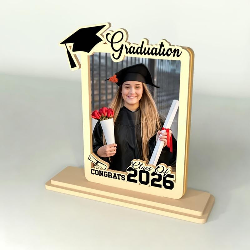 Beige wooden graduation photo frame with black cutout accents featuring graduation and class of 2026 text for commemorating the class of 2026.