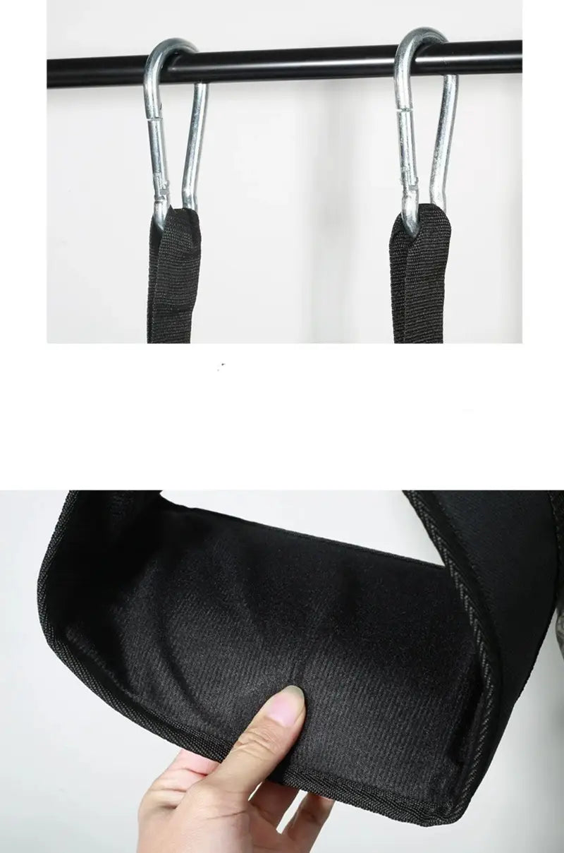 Black fabric ab sling straps with metal carabiner hooks heavy duty hanging leg raise straps designed for fitness use.