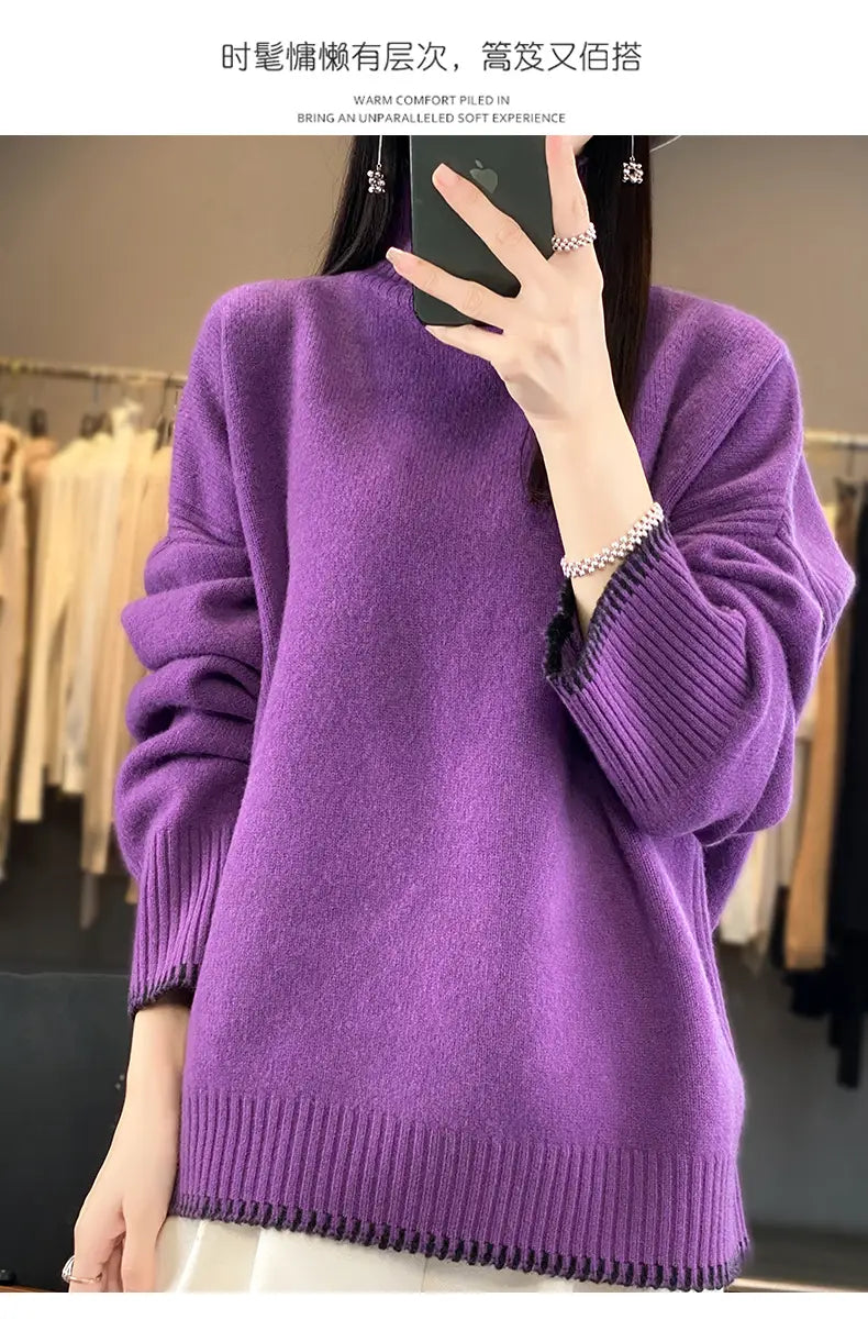 A soft vibrant purple pure wool turtleneck sweater for women featuring ribbed cuffs and hem.