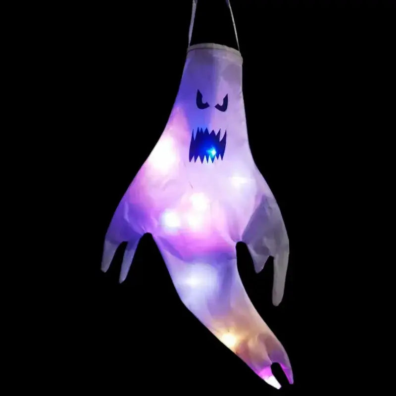 a glowing purple and blue inflatable halloween ghost led hanging windsock with a menacing face for home outdoor decoration
