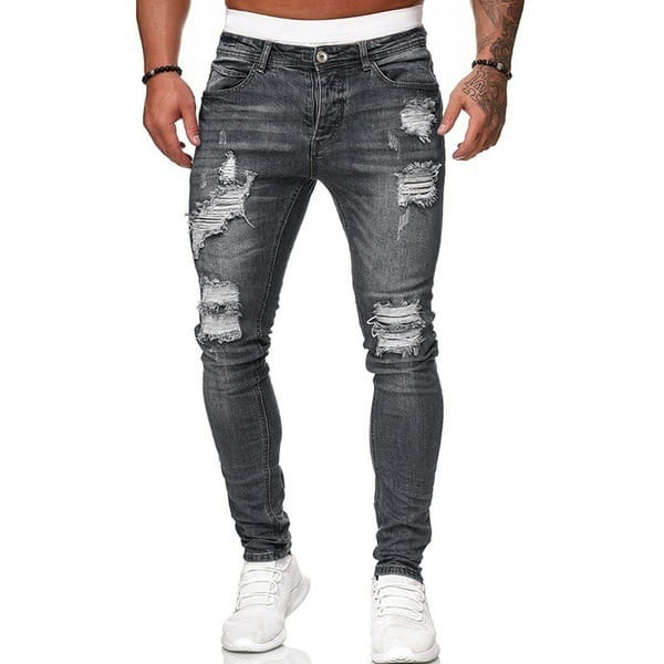 Männer rissen schmale Jeans aus dunklem grauem, distressed Stoff mit ausgewaschenem Effekt und Riss-Kniepatches.
