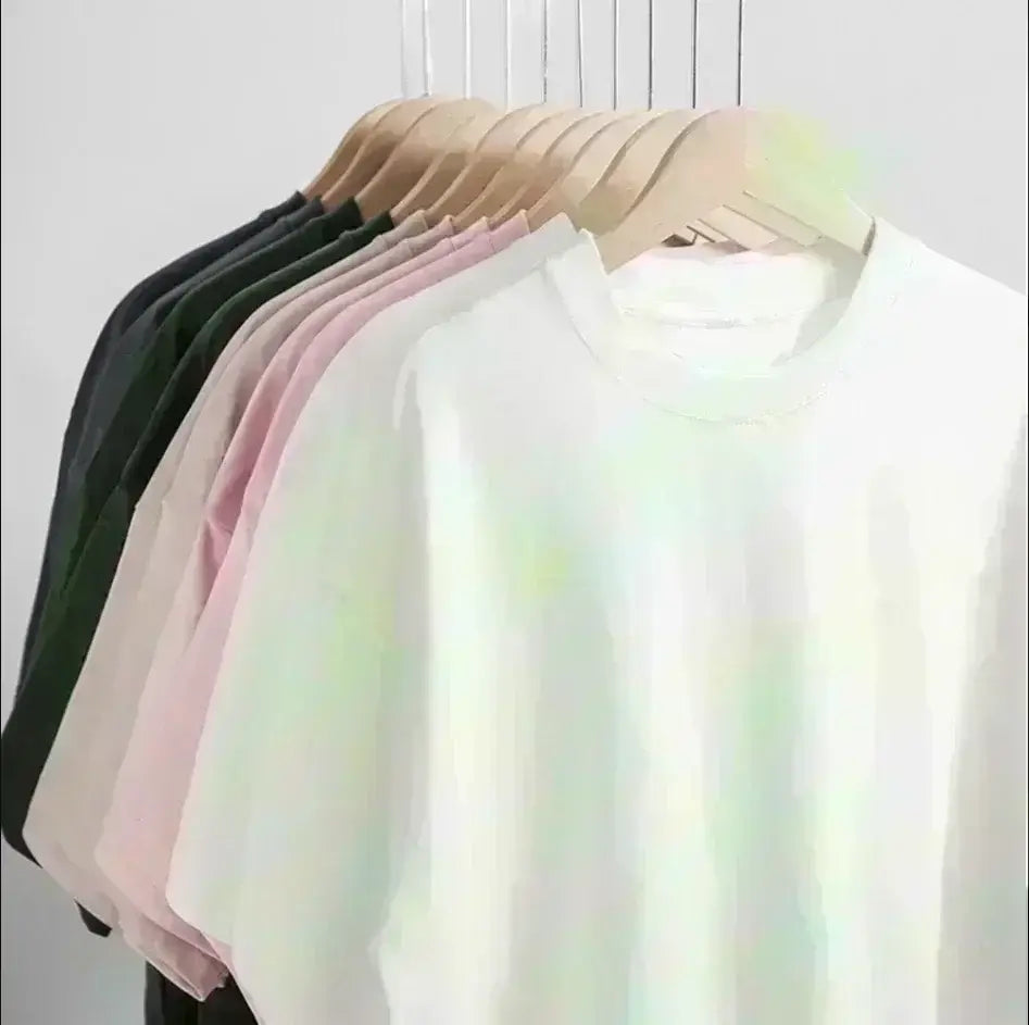 The office cast printed cotton t-shirt white unisex features a soft minimalist crewneck design with subtle pastel green and yellow tie-dye swirls.