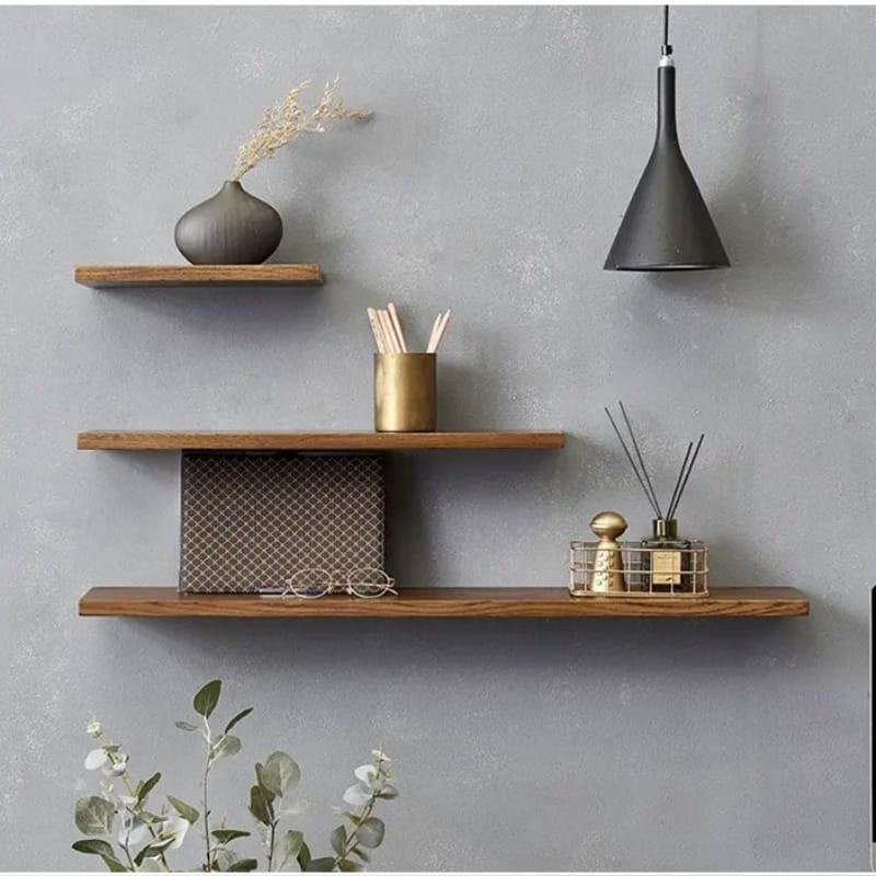 three floating wooden shelves with a warm natural finish showcasing wall farmhouse wooden design in farmhouse wooden shelves live edge wall shelf style