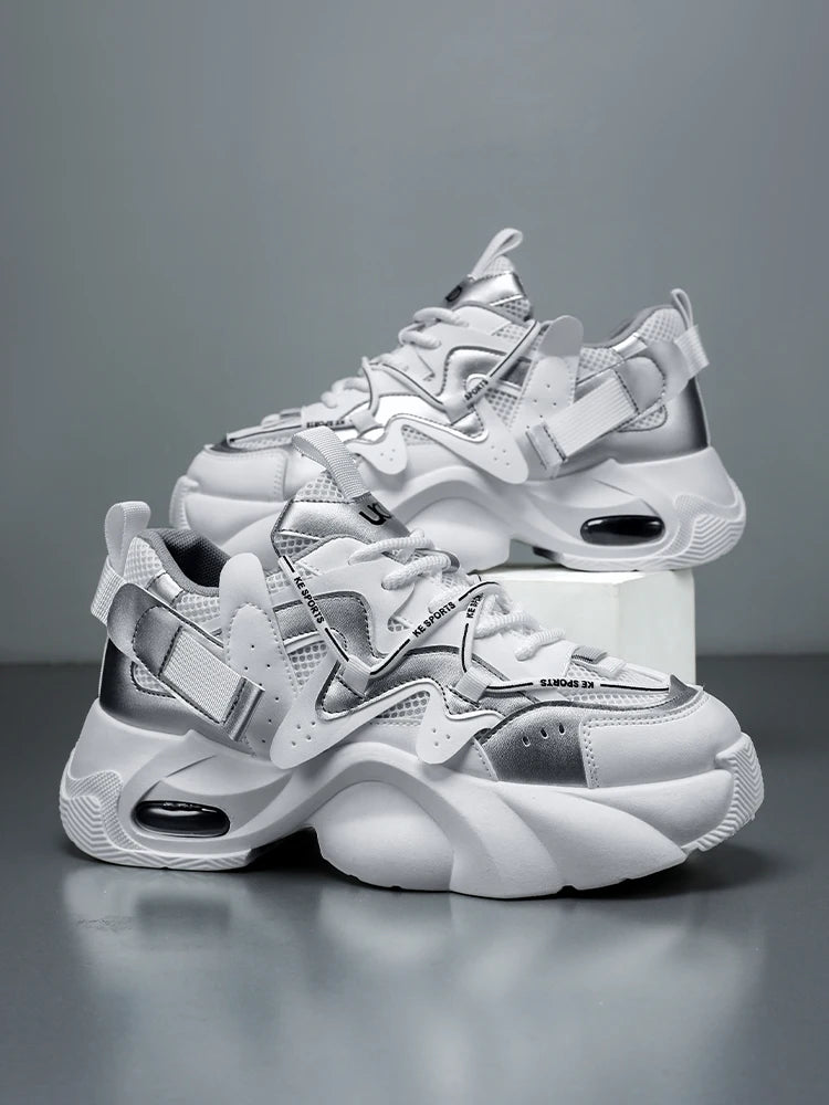 Men chunky air cushion casual sneakers in white and silver featuring a bold layered design with mesh panels and metallic accents.