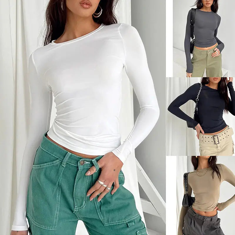 Blusa corta de manga larga con ajuste slim y diseño fruncido, confeccionada con material suave para mujer.