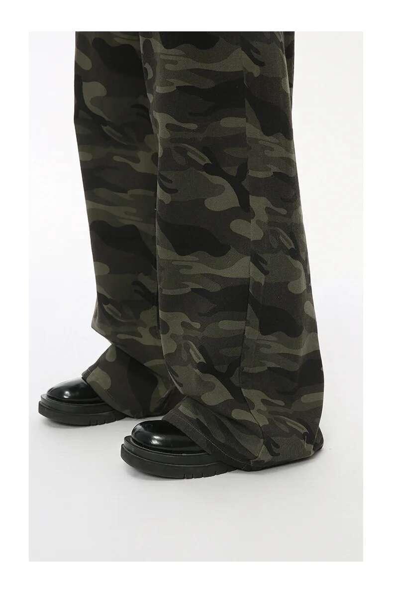 Iefb camouflage wide leg denim jeans in dark green and black camouflage pattern with soft flowing fabric and a wide leg design.