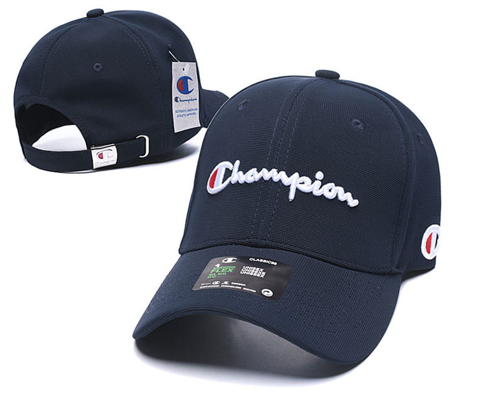 Navy blue Champion baseball cap featuring a white embroidered logo and red circular emblem on the side designed as a summer sun hat for unisex use.