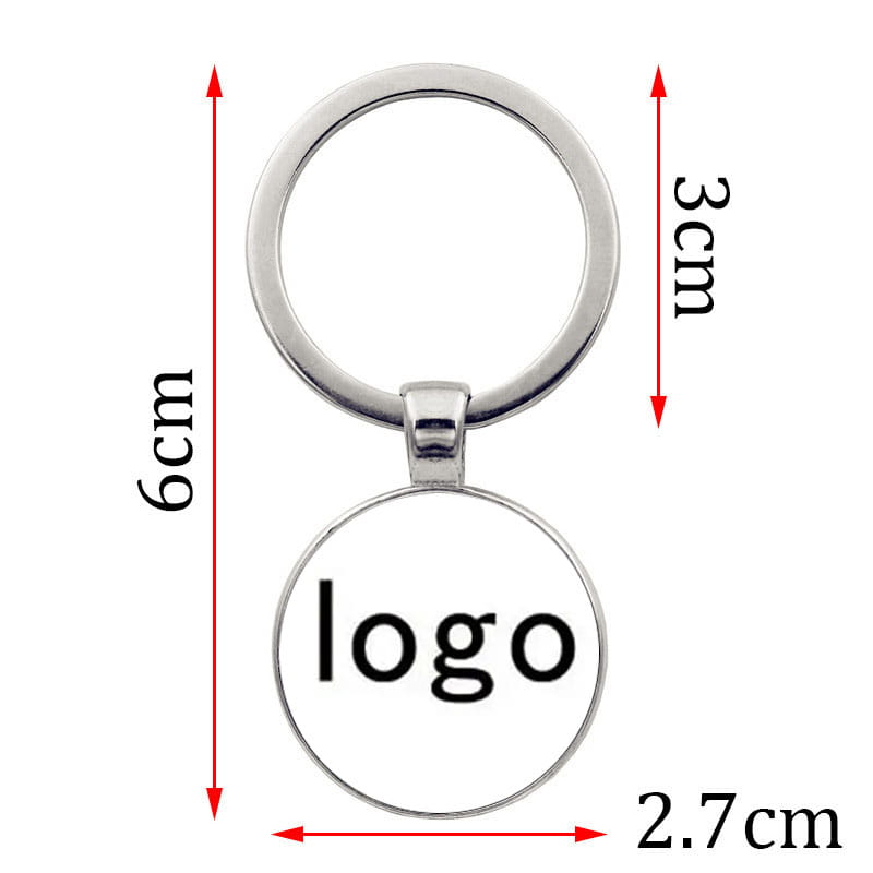Custom photo logo silver keychain featuring a silver-toned keyring with a round clear glass pendant displaying the word logo in black text.