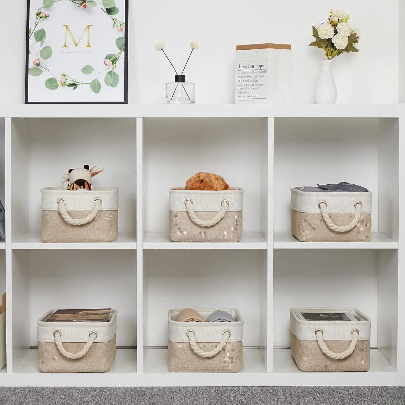 paniers de rangement en tissu pliables beige et blanc avec des poignées en corde pour une organisation polyvalente et des solutions de rangement