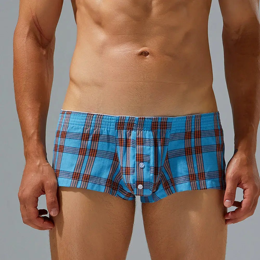 Men plaid boxer shorts lounge pants in blue and brown plaid with button closure made of comfortable fabric.