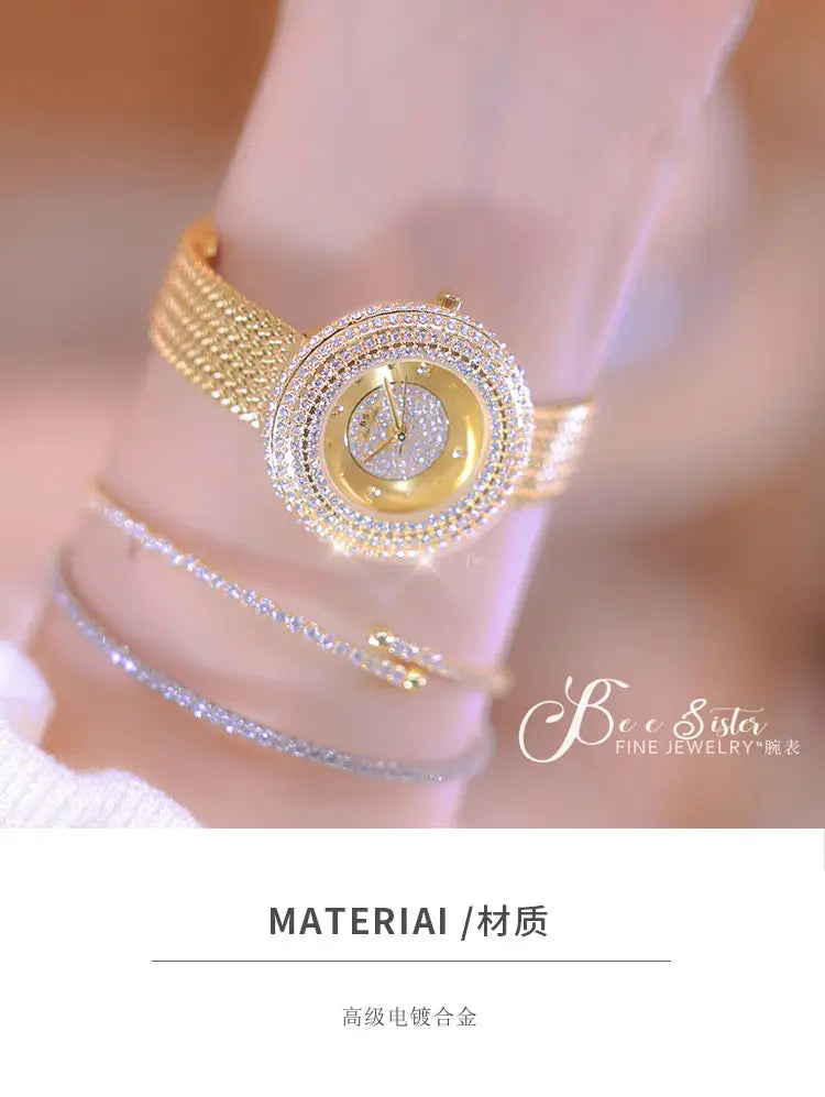 Gold-toned gold diamond mesh women watch luxury waterproof with a diamond-encrusted bezel and an elegant circular face featuring a mesh band.