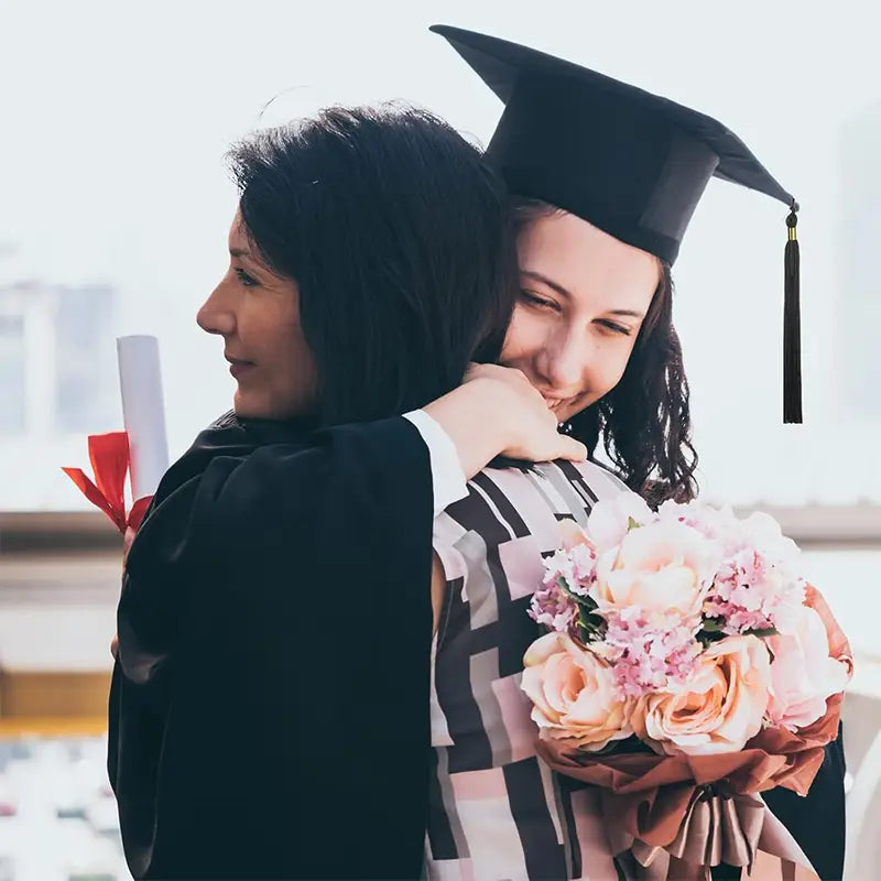 Black adult graduation cap with black tassel displayed from the back side for 2025 ceremonies.