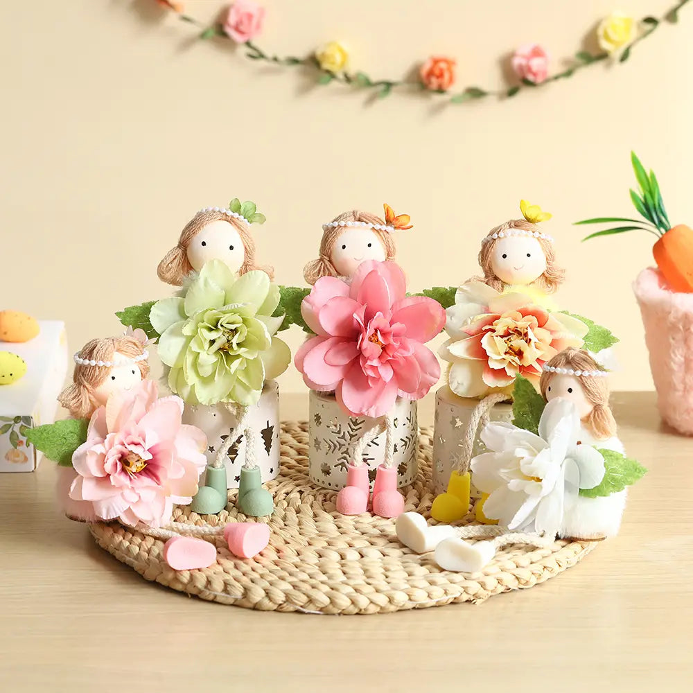 Zuckersüße Osterhasen-Feen-Ornamente in Pastellfarben mit floralen Kleidern und zarten Accessoires aus Harz für festliche Dekoration.