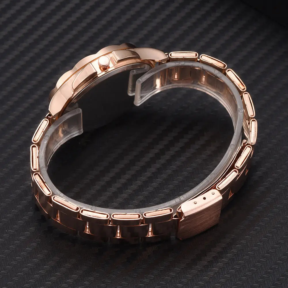 Rose gold women luxury watch quartz business wristwatch featuring a rose gold-toned stainless steel band with a sleek interlocking link design and polished finish.