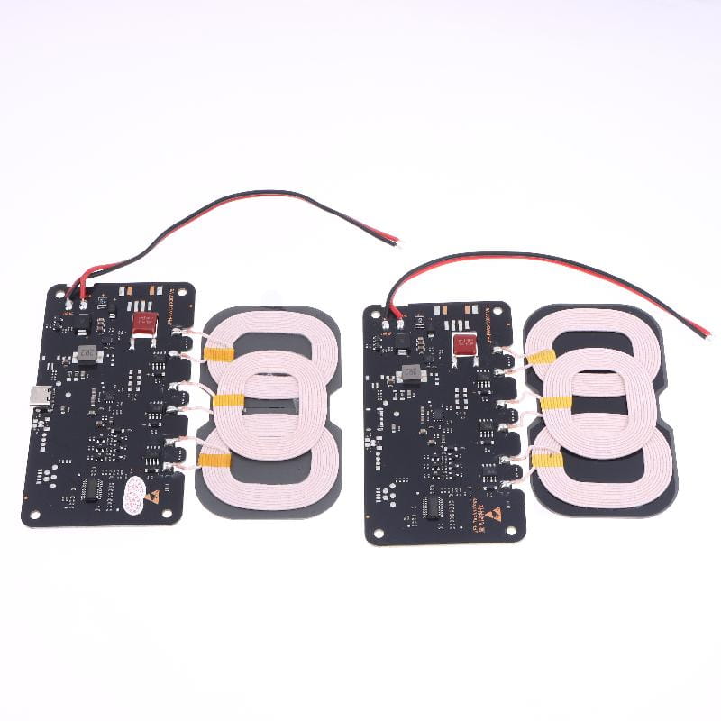 two black wireless charging coils with white coil windings and red and black wires mounted on printed circuit boards for a 20w wireless charger module for car and home use