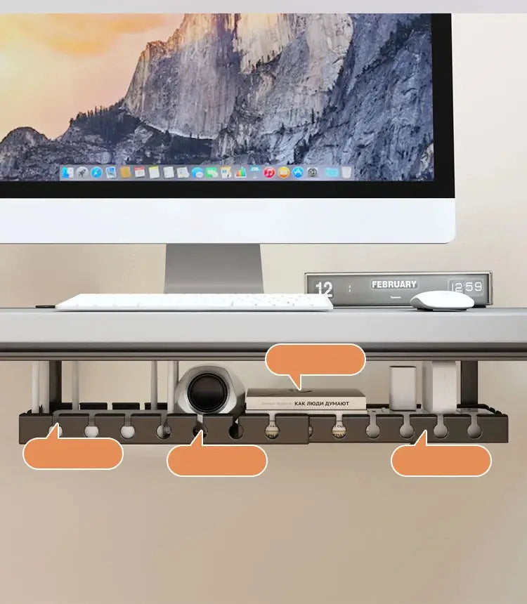Black metal wire desk cable management tray organizer with multiple slots and rounded pegs for holding cables devices and accessories.