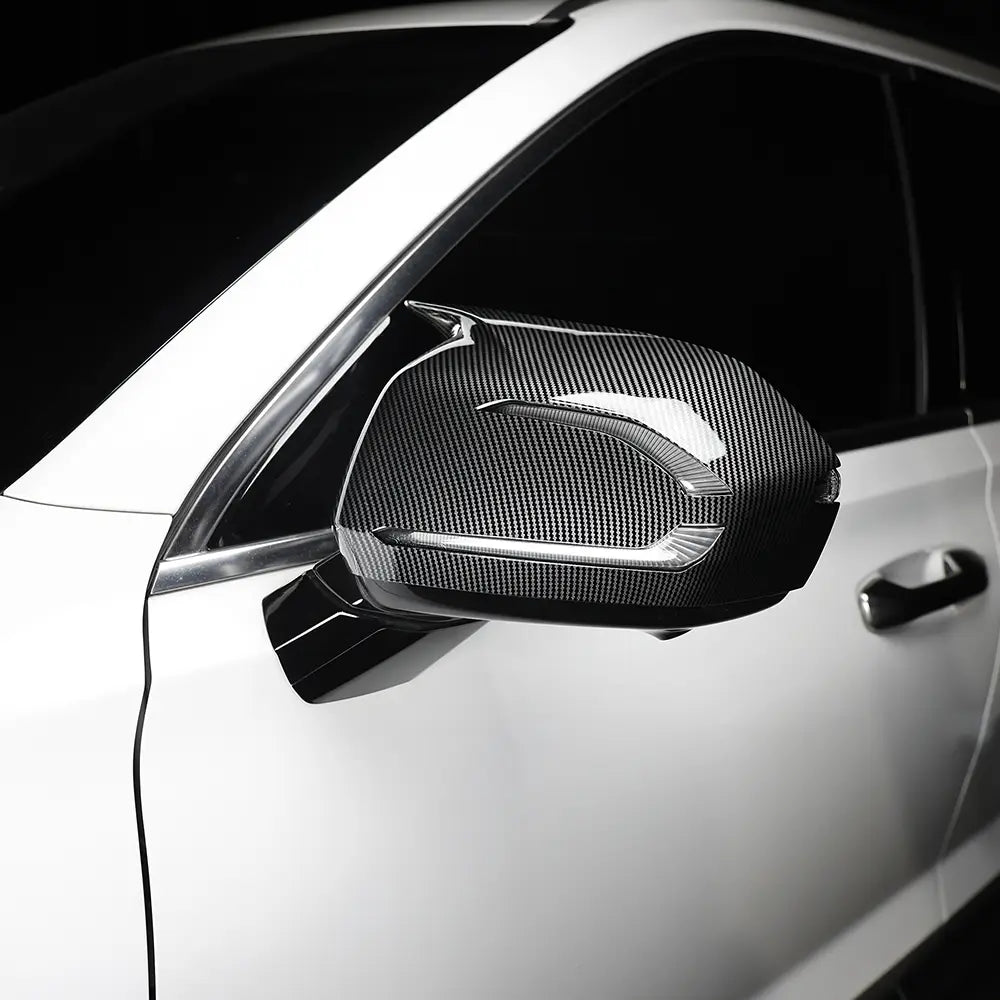 Hyundai Palisade led mirror covers featuring carbon fiber textured side mirror cover with sleek silver accent trim for 2020-2025 models.