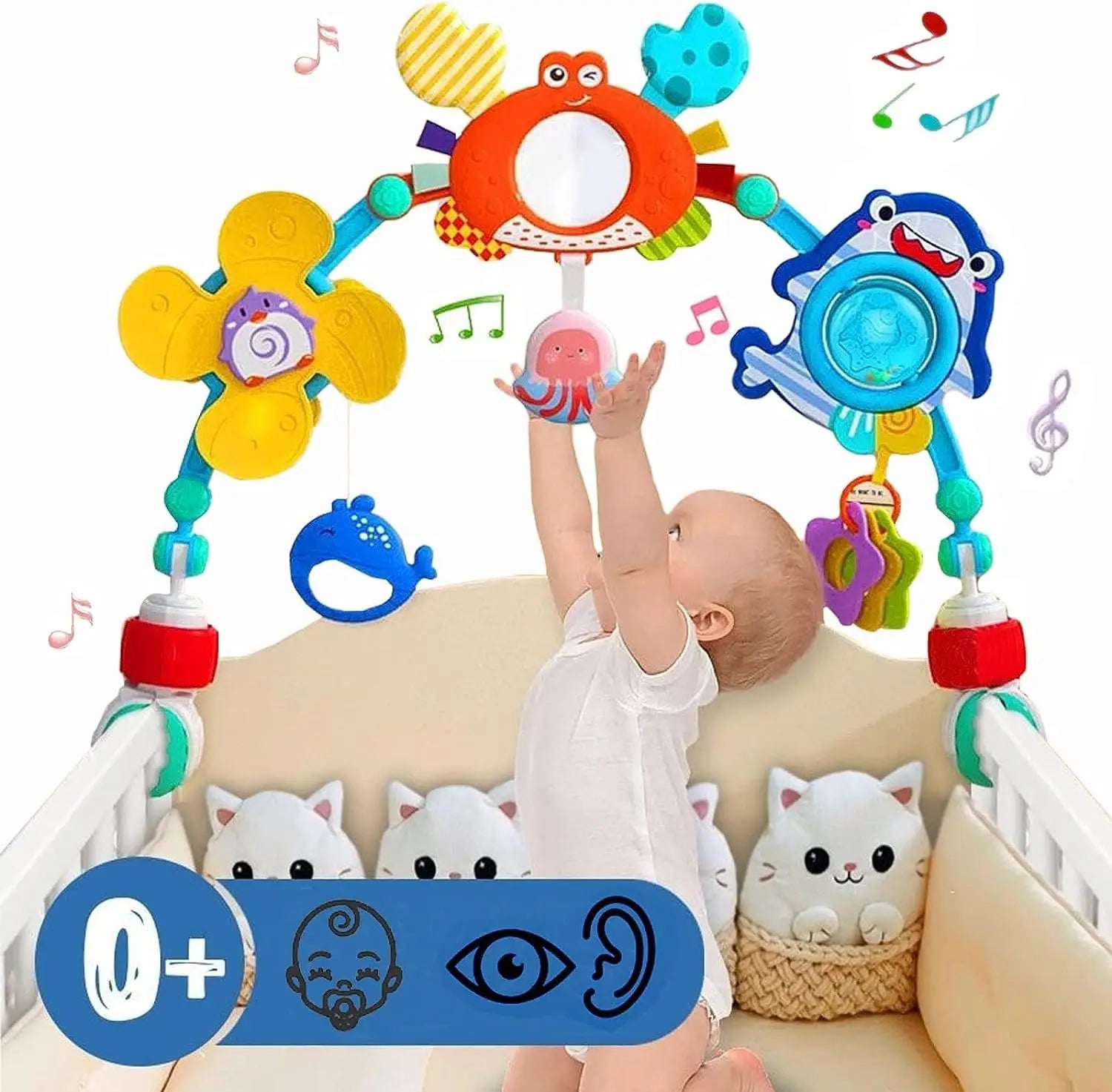 buntes Baby-Mobile im Ozean-Thema mit Plüsch-Meerestieren und musikalischen Elementen, ausgelegt als Fahrwagenbogen-Spielzeug für sensorische Aktivitäten für Babys.