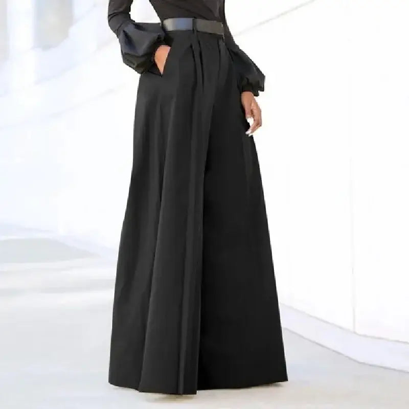 Schwarze weite Hosen für Damen mit hoher Taille und maßgeschneiderter Passform sowie dezenten Falten am Bund, geeignet für die Bürokleidung.