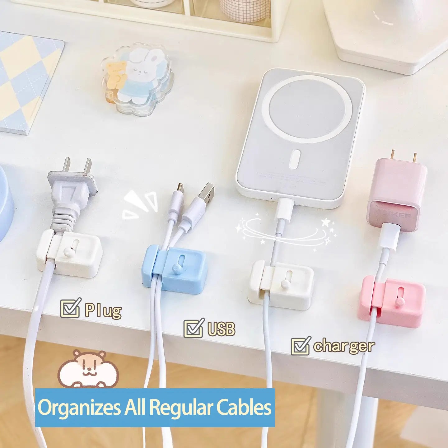 Pastellfarbene Kabelmanagement-Klemmen für den Schreibtisch aus Kunststoff mit einem Design zur Kabelführung ohne Bohren für Steckverbindungen, USB-Kabel und Ladegeräte.