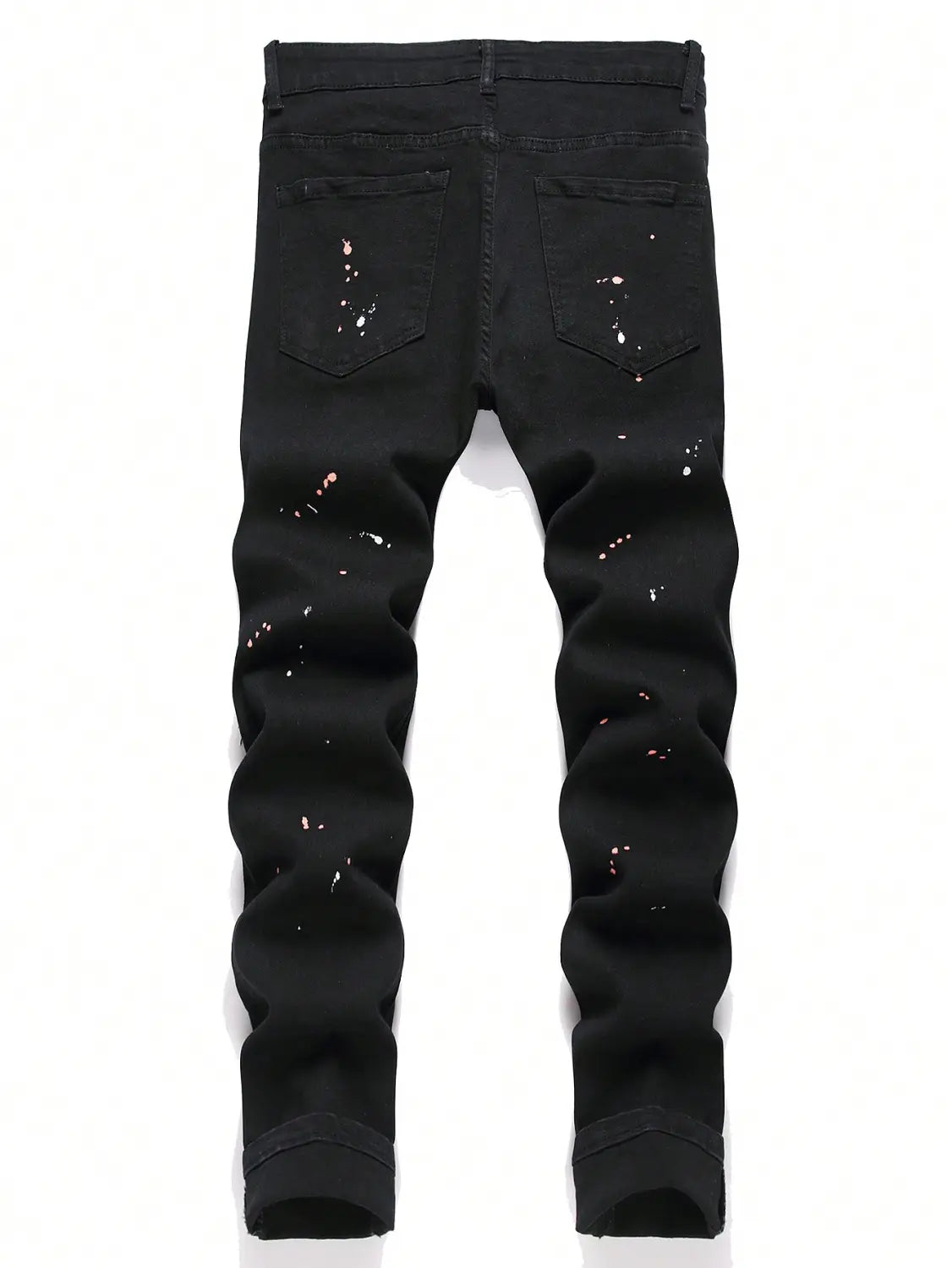 Jeans denim noirs skinny extensibles déchirés Y2K pour hommes, avec des accents d’éclaboussures de peinture blanc et rose.