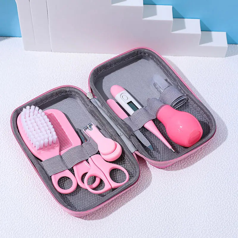 8-teiliges Pflege- und Grooming-Set für Babys mit einem rosa Baby-Pflegeset mit weichen Silikonwerkzeugen und grauem Mesh-Innenfutter.