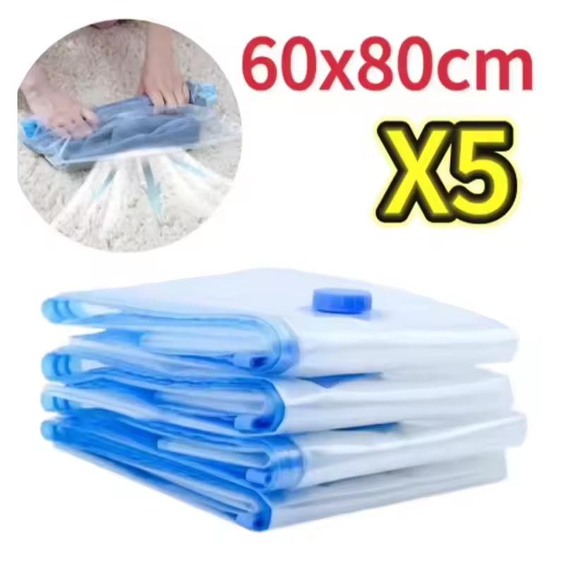 Set of five transparent vacuum storage bags made of pa+pe material with blue plastic seals and caps measuring 60x80cm each.