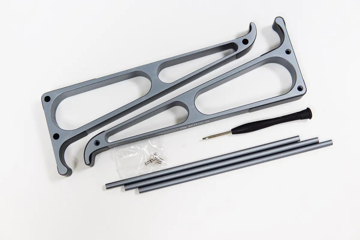 Gray aluminum Orico portable laptop stand and desktop riser with sleek angular design and matching rods